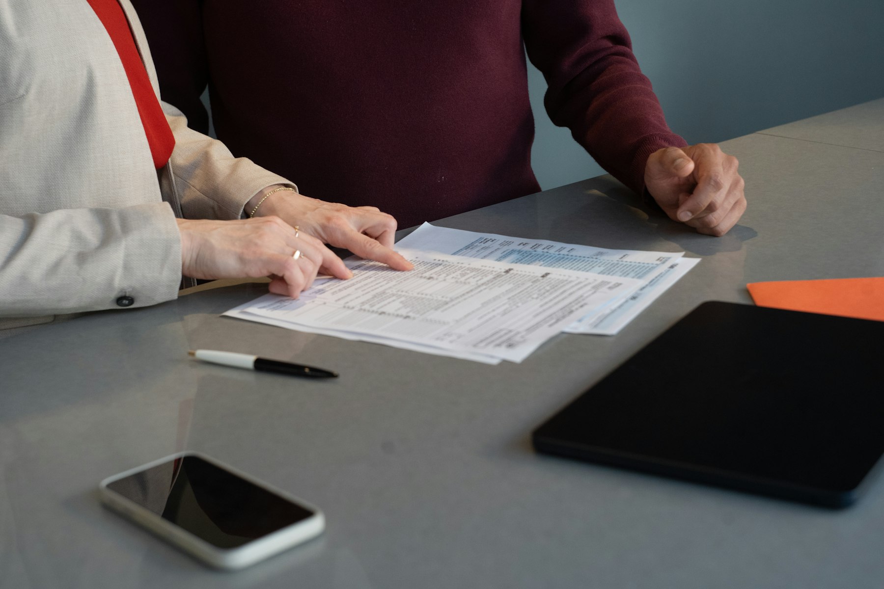 Business documents being reviewed at a desk