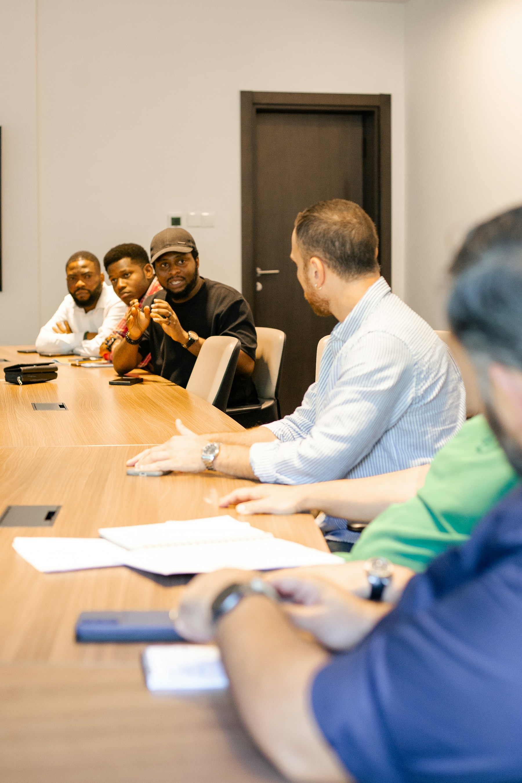Diverse team discussing business decisions in a meeting